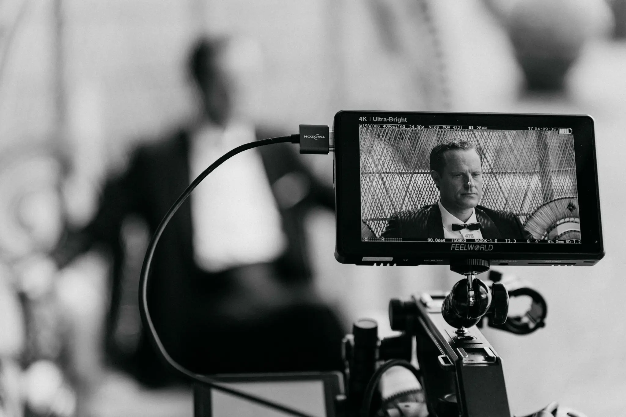 4K field monitor showing a lit frame during a production shot by Matteo Castelli