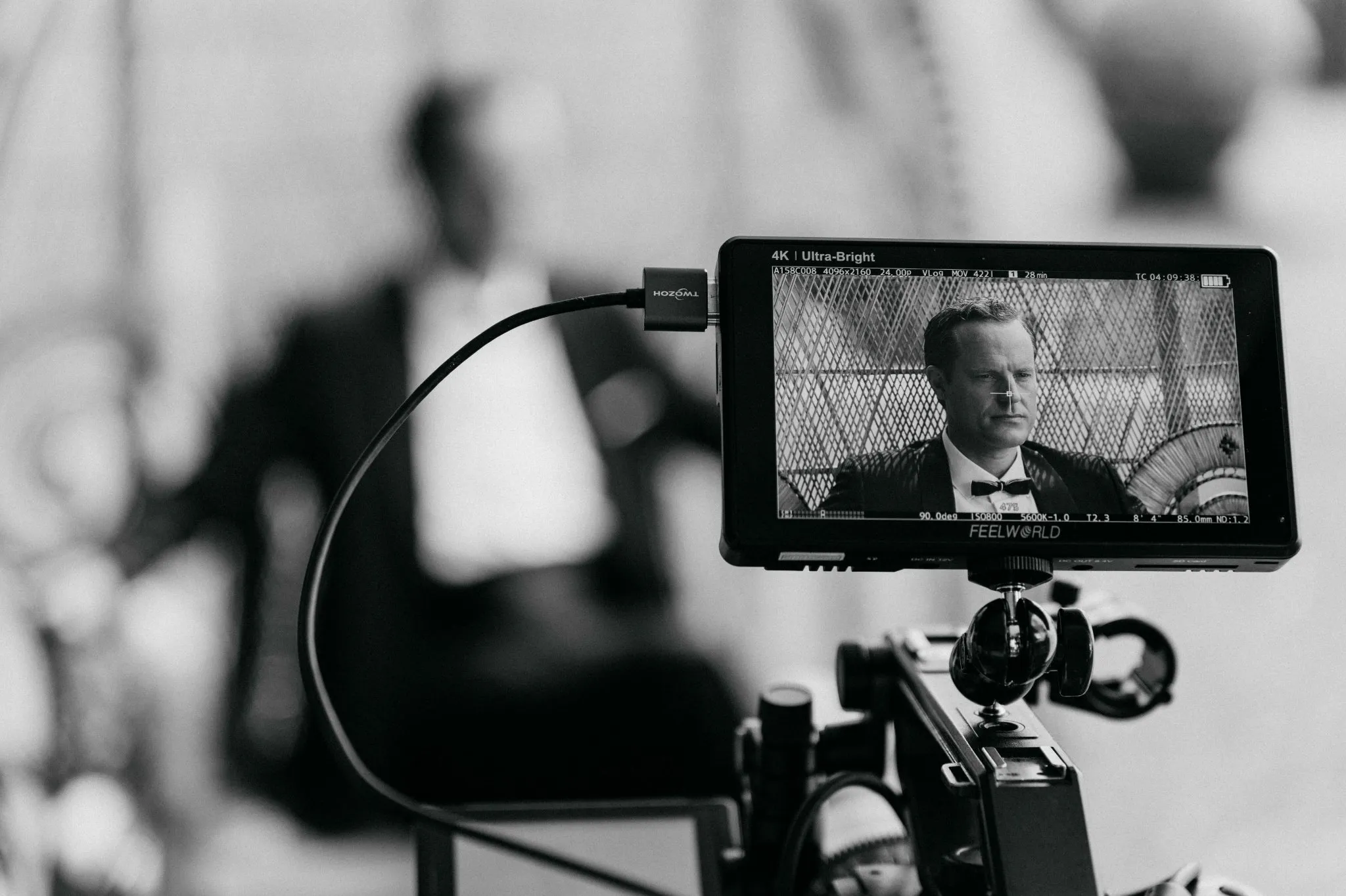 4K field monitor showing a lit frame during a production shot by Matteo Castelli