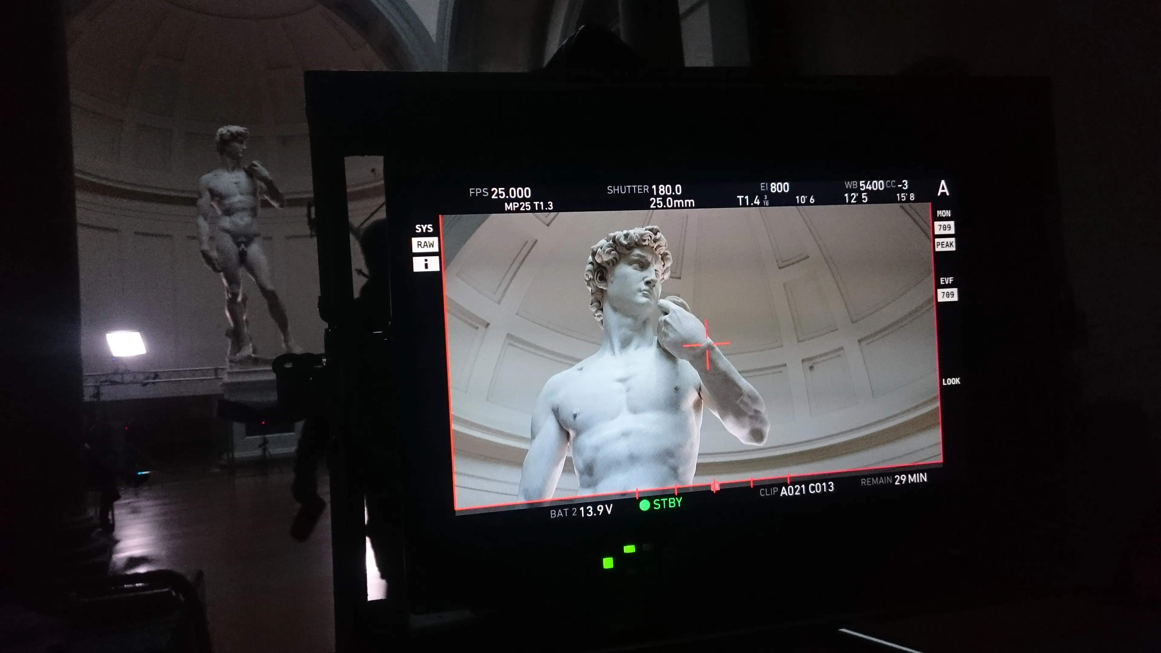 Michelangelo's David framed on a cinema camera monitor during filming at the Galleria dell'Accademia in Florence