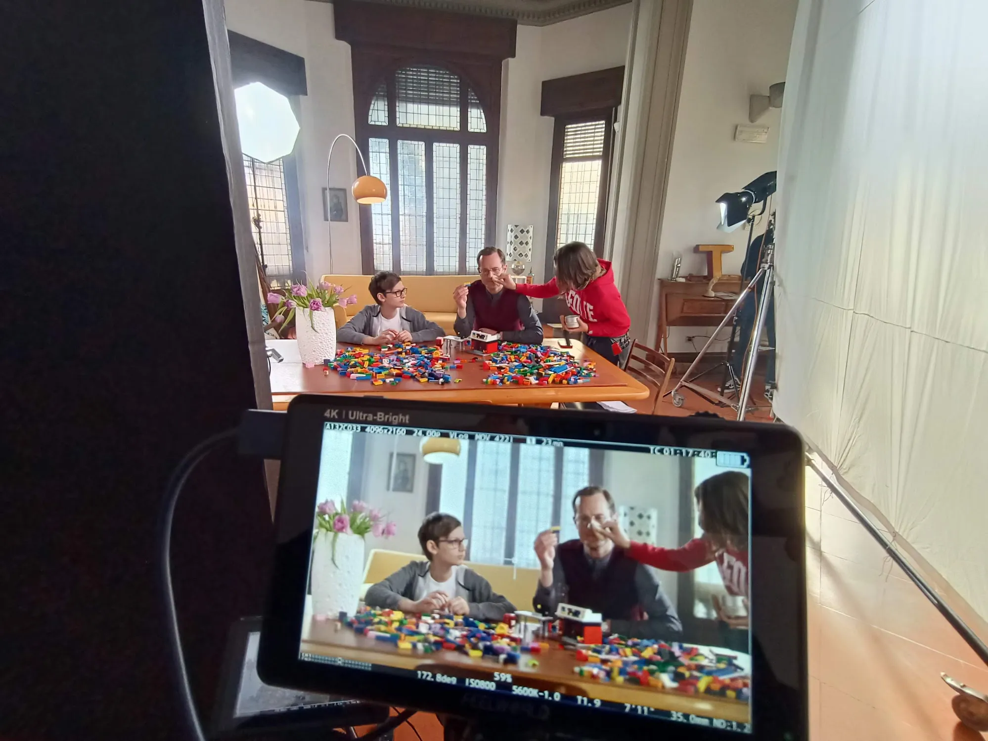 Matteo Castelli reviewing footage on an external monitor during a commercial shoot